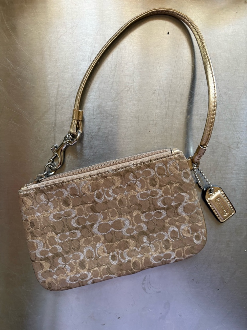 Coach Tan Signature Canvas Wristlet with Metallic Strap